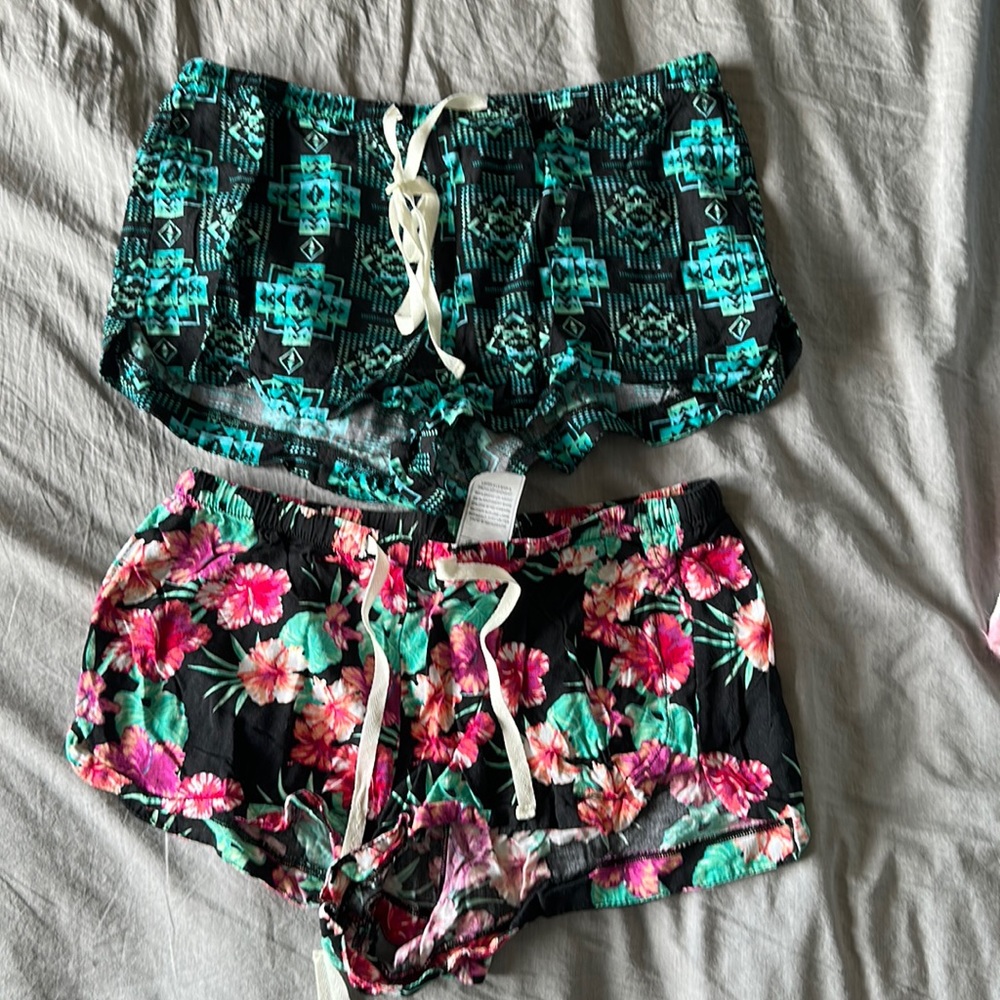 Empyre shorts x 2 women’s size medium, black Hawaiian floral and teal motif
